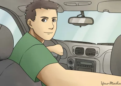 1_How_to_Drive_a_Car_in_Reverse_Gear_a_teen_with_their_eyes_closed_while_looking_over_their_right_shoulder_while_driving_in_reverse